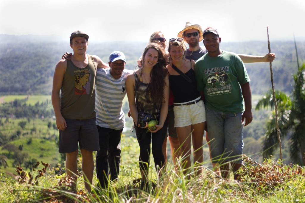 Taino Organic Farm volunteers as well as permaculture designer Charlie Durrant and farmers Victor and Juan Carlos atop a mountain overlooking Los Brazos, Dominican Republic