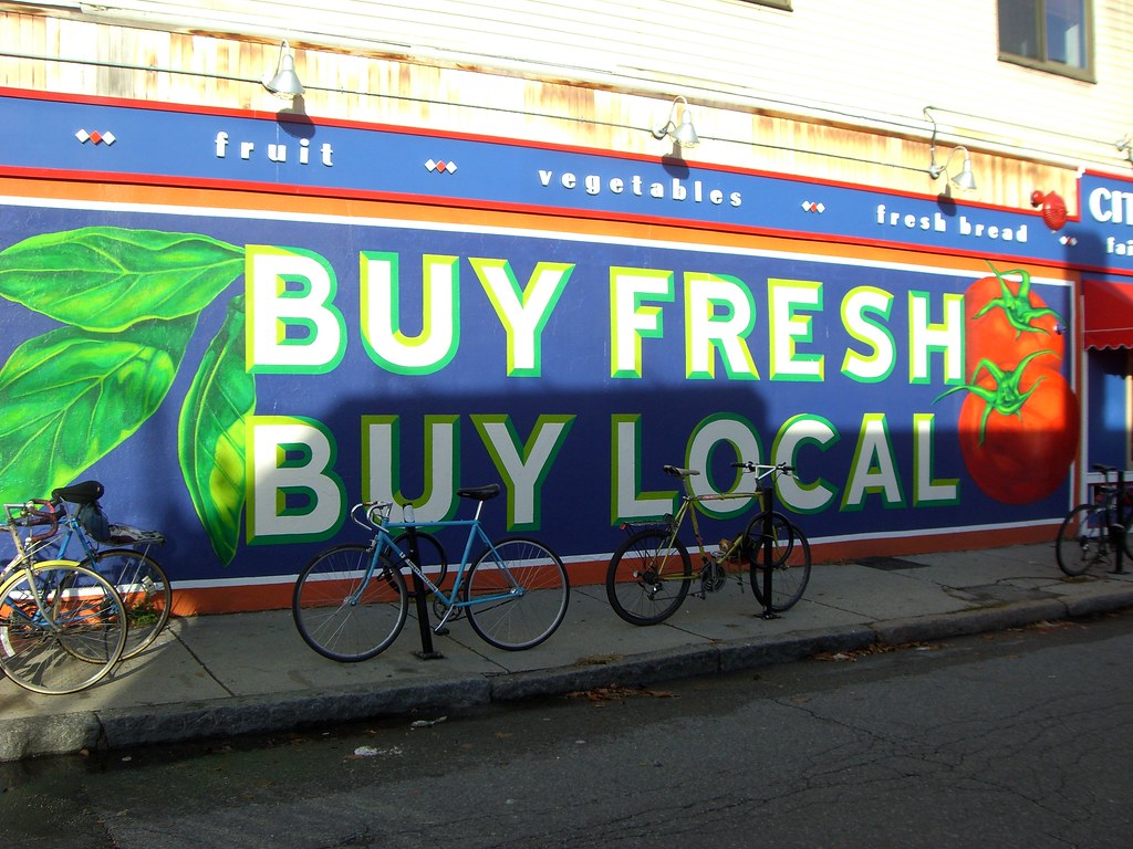 buy fresh and buy local sign promotes local businesses